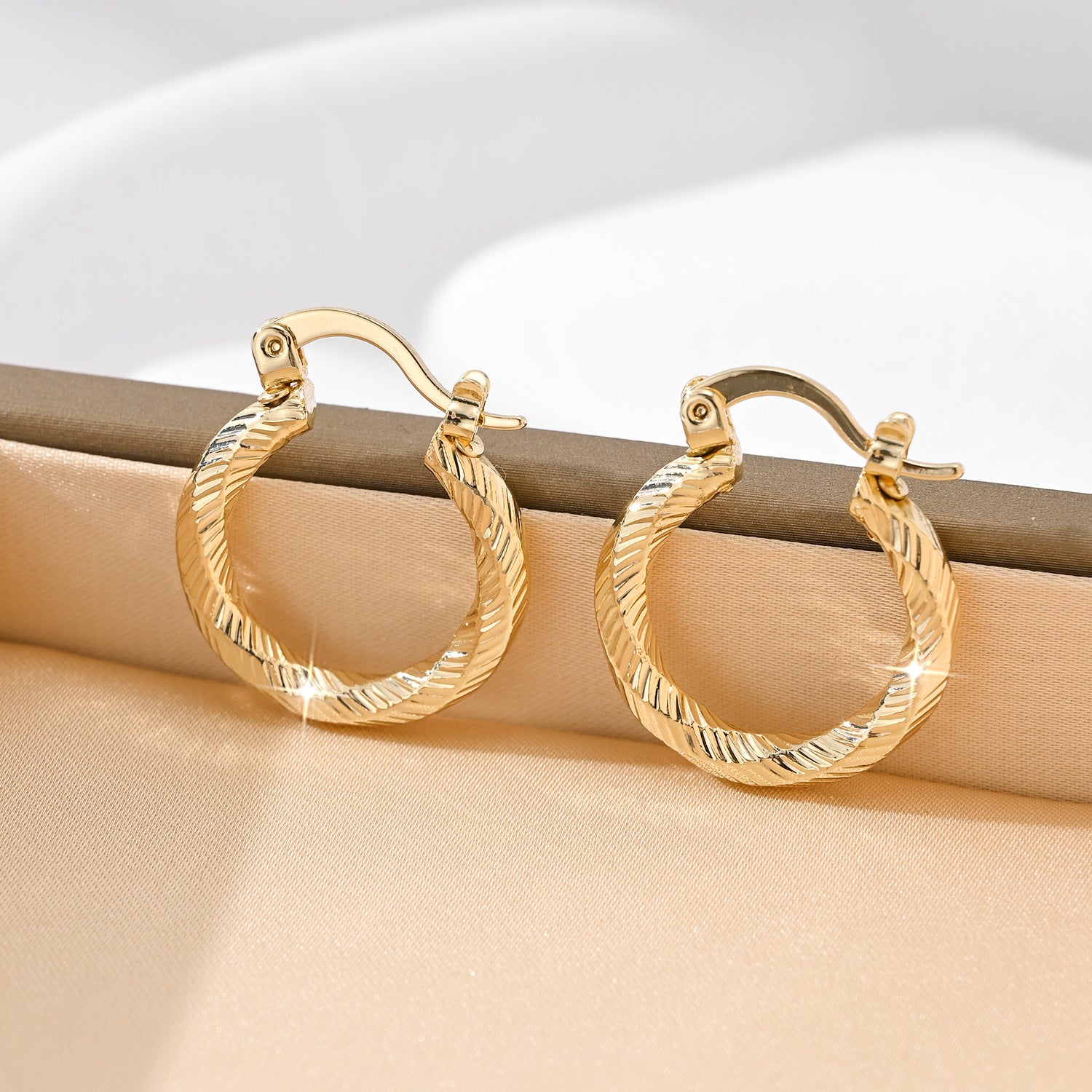 Luxe 18K Gold Huggie Collection