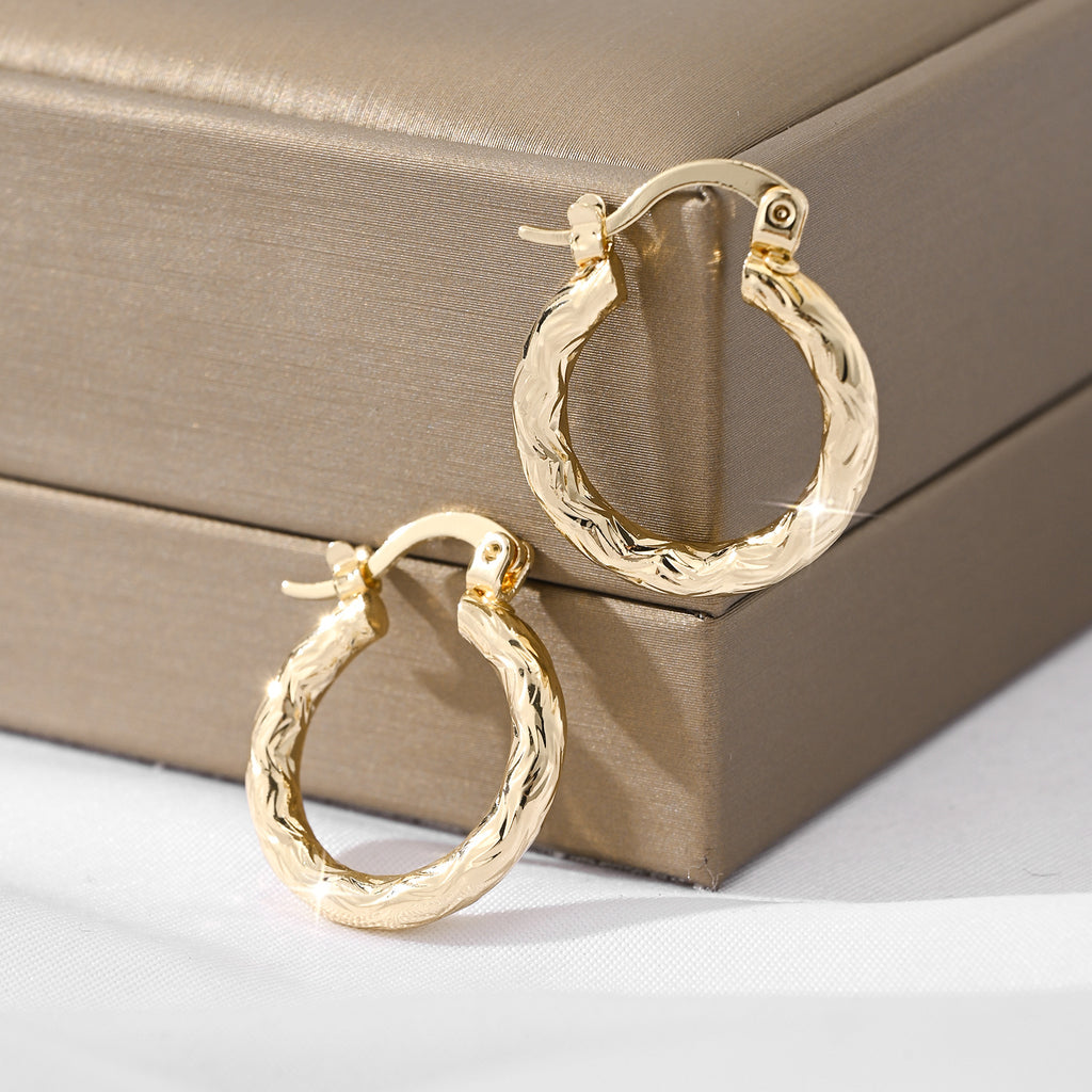 Luxe 18K Gold Huggie Collection