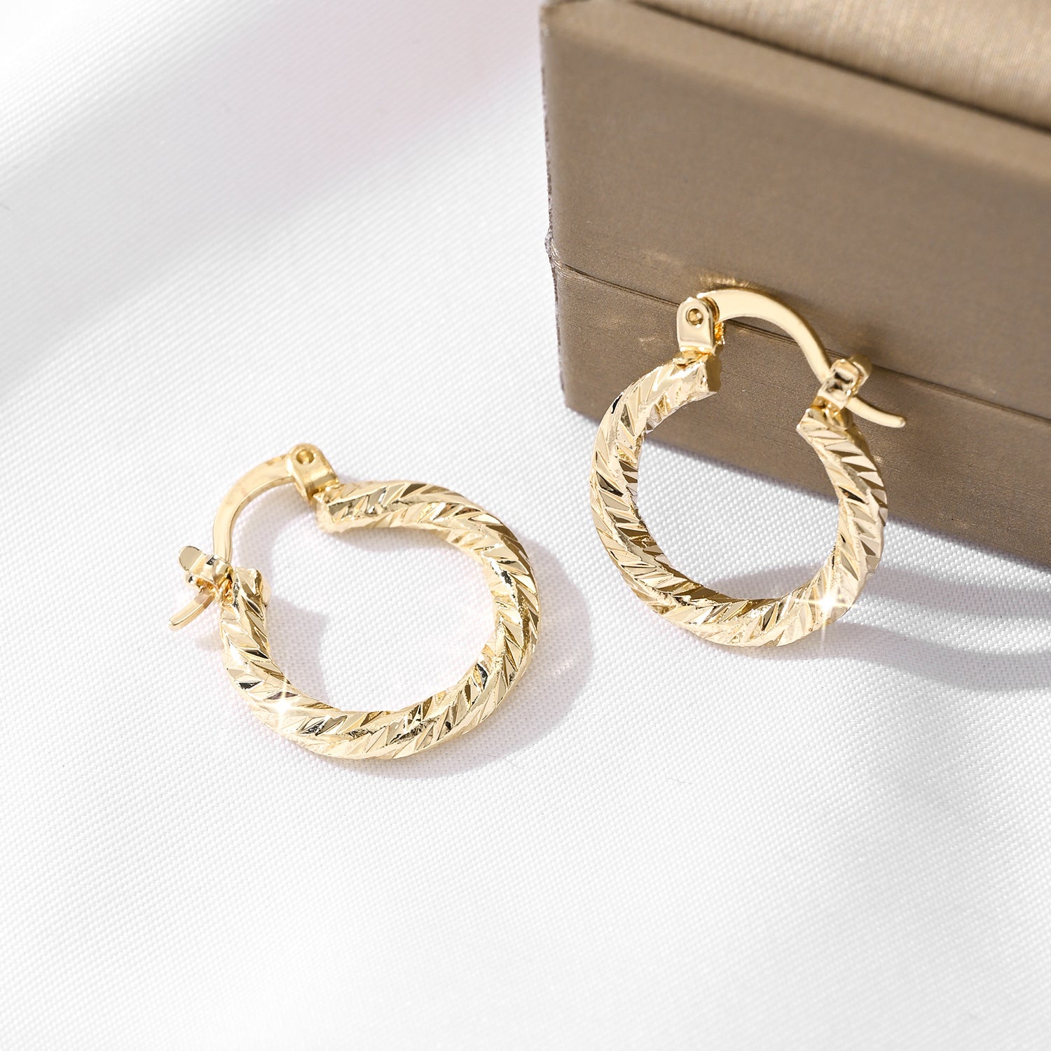 Luxe 18K Gold Huggie Collection
