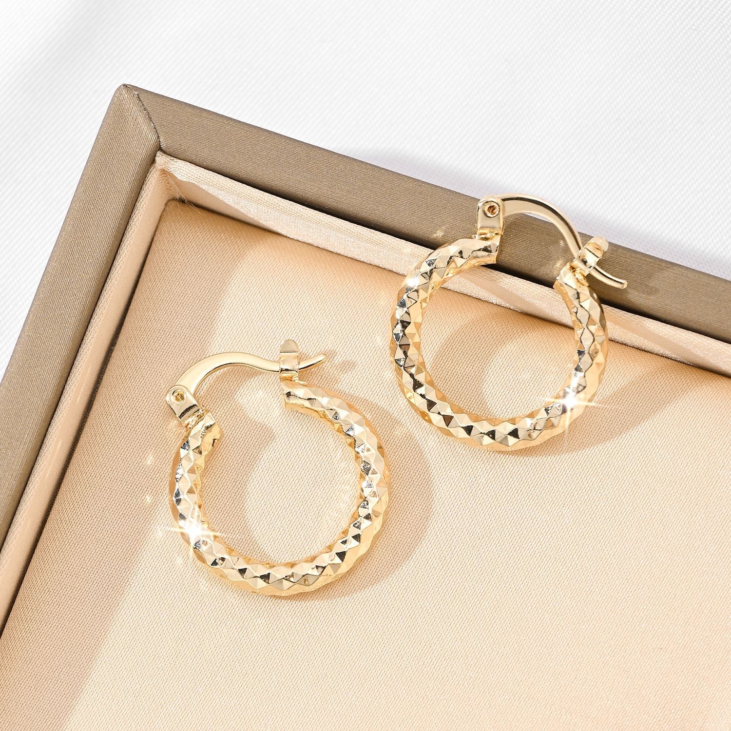 Luxe 18K Gold Huggie Collection